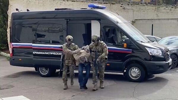 Сотрудники ФСБ задержали украинского диверсанта при подготовке теракта на транспортном терминале в Брянске. Кадр из видео