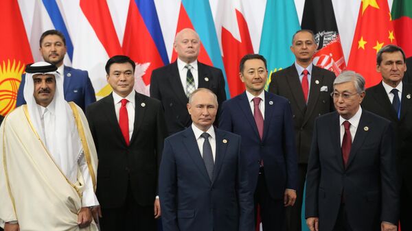 Президент РФ Владимир Путин на церемонии совместного фотографирования глав делегаций