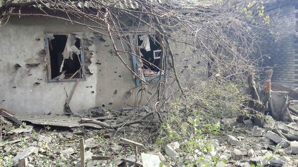 Последствия обстрела поселка Мичурина в Никитовском районе Горловки