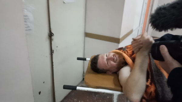 Раненый журналист Семен Пегов после операции