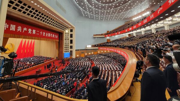 Депутаты в зале заседаний на открытии XX Всекитайского съезда Коммунистической партии Китая (КПК) в Доме народных собраний в Пекине
