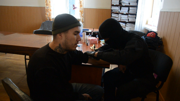 Бывшие украинские военные избавляются от татуировок