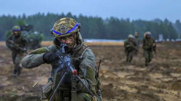 Совместные учения войск НАТО Iron Wolf - 22 в Латвии. Архивное фото