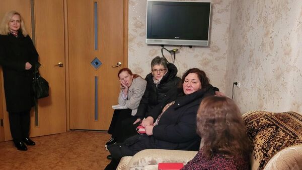 Делегация ООН посещает квартиру беженцев с Украины