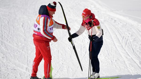 Тренер сборной России по лыжному спорту Юрий Бородавко и Наталья Непряева