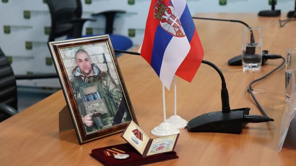 Фотография погибшего добровольца из Сербии