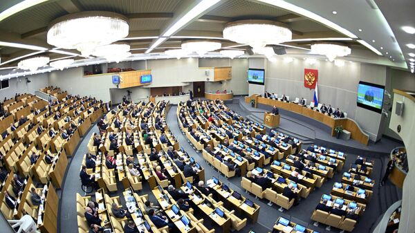 Депутаты на пленарном заседании Государственной Думы РФ
