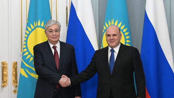 Председатель правительства РФ Михаил Мишустин и президент Республики Казахстан Касым-Жомарт Токаев во время встречи. 28 ноября 2022
