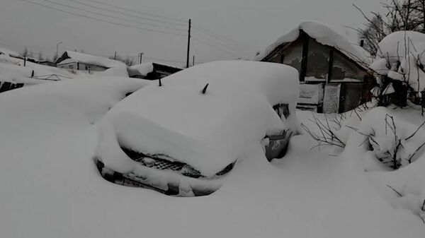 Последствия снегопада в Магадане