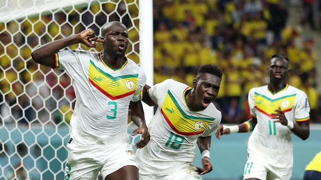Футболисты сборной Сенегала на чемпионате мира по футболу 2022 года в Катаре