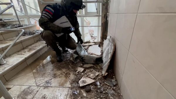 Работа следователей на месте обстрела в Донецке