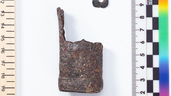 Подвесная скоба и наконечник ножен, X - XI век. Южный Алтай.
Кимаки: Цветной металл, литьё.
