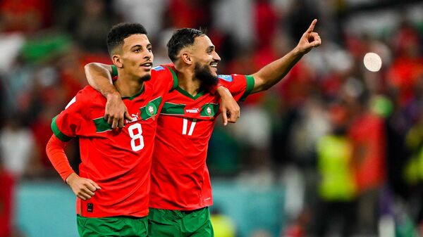 Марокканский футболист Аззедин Унахи (слева) на чемпионате мира 2022 года в Катаре