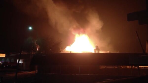 Пожар в пункте обогрева в Киеве, Украина. Кадр видео очевидца