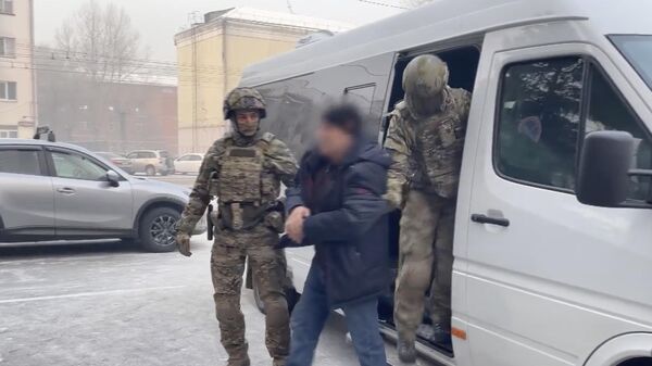 Задержанный по подозрению в покушении на государственную измену в Республике Хакасия