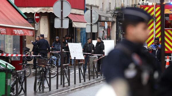 Полицейские на месте стрельбы в Париже. 23 декабря 2022