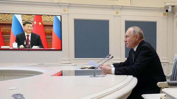 Президент России Владимир Путин во время переговоров в режиме видеоконференции с председателем Китайской Народной Республики Си Цзиньпином