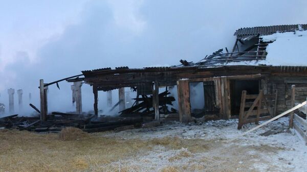 Последствия пожара в деревне Куреж в Красноярском крае