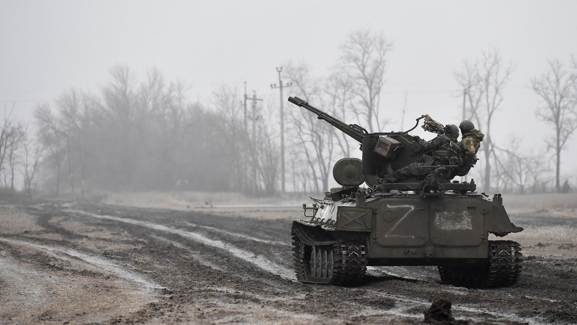 Военнослужащие на бронетранспортере МТ-ЛБ с зенитной установкой ЗУ-23 в зоне СВО - РИА Новости, 1920, 31.03.2023