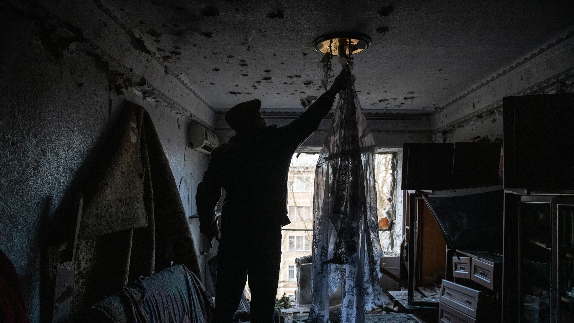 В квартире дома в Донецке после обстрела ВСУ - РИА Новости, 1920, 31.01.2023