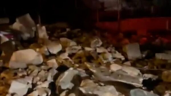 Поврежденные здания и обломки на земле: последствия землетрясения в Алеппо