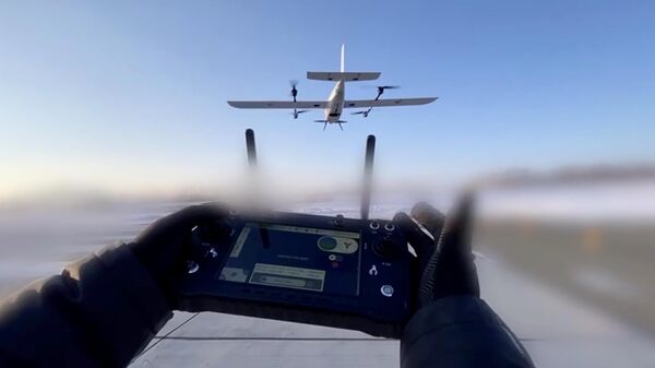 Кадр видео испытания БПЛА самолетного типа с вертикальным взлетом в Приморье