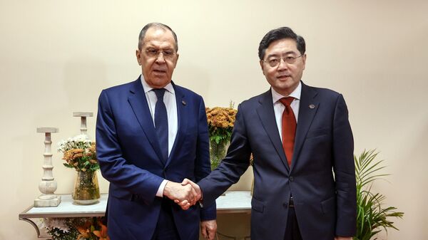 Министр иностранных дел России Сергей Лавров и глава МИД КНР Цинь Ган