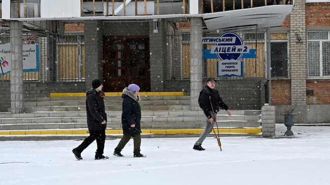 Местные жителя в Купянске Харьковской области