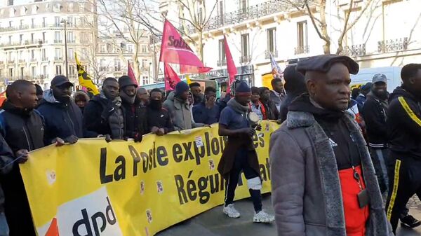 Акция в Париже против закона, ужесточающего миграционную политику