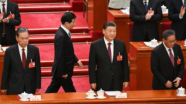 Председатель Китайской Народной Республики Си Цзиньпин на Всекитайском собрании народных представителей. 10 марта 2023
