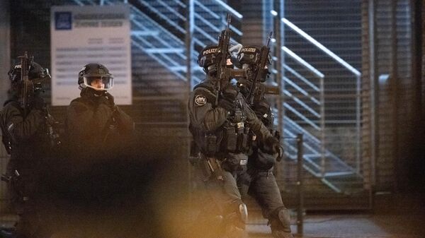 Полицейские на месте стрельбы в Гамбурге. 9 марта 2023