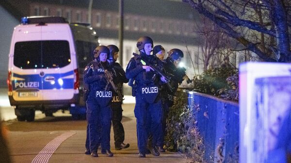 Полицейские на месте стрельбы в Гамбурге. 9 марта 2023