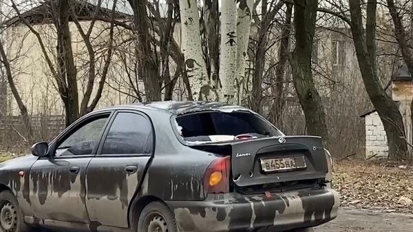 Кадры с места обстрела ВСУ в Донецке, где погибли мужчина и семилетний ребенок 