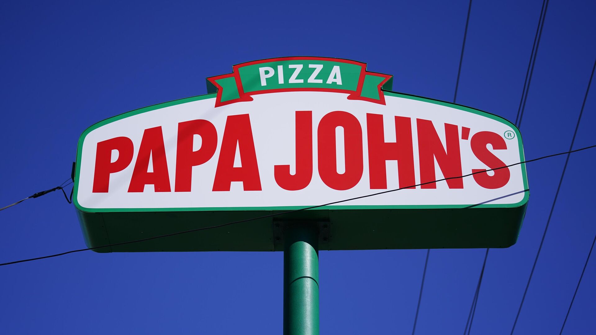 Вывеска пиццерии Papa John's  - РИА Новости, 1920, 14.03.2023