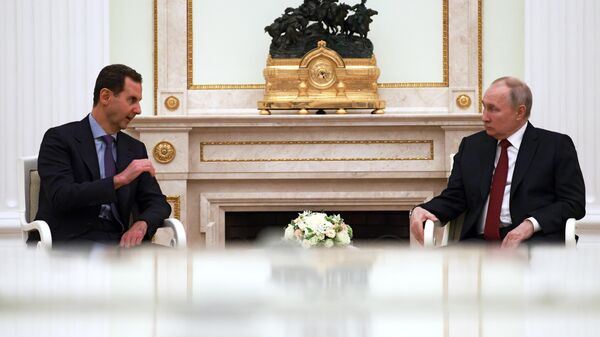 Президент РФ Владимир Путин и президент Сирии Башар Асад во время встречи. 15 марта 2023