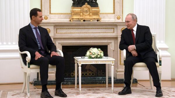 Президент РФ Владимир Путин и президент Сирии Башар Асад во время встречи. 15 марта 2023