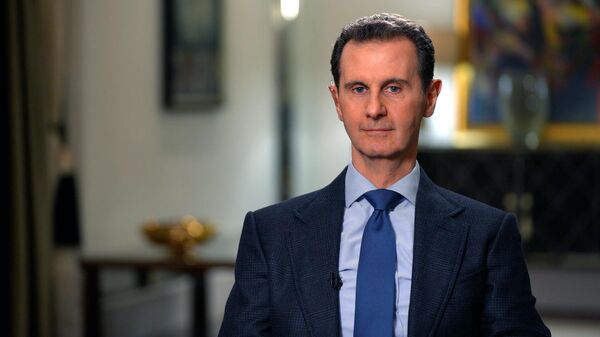 Президент Сирии Башар Асад во время интервью РИА Новости