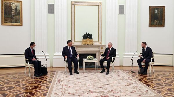 Президент РФ Владимир Путин и председатель Китайской Народной Республики Си Цзиньпин во время встречи