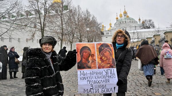 Верующие в Киево-Печерской лавре в Киеве. 29 марта 2023