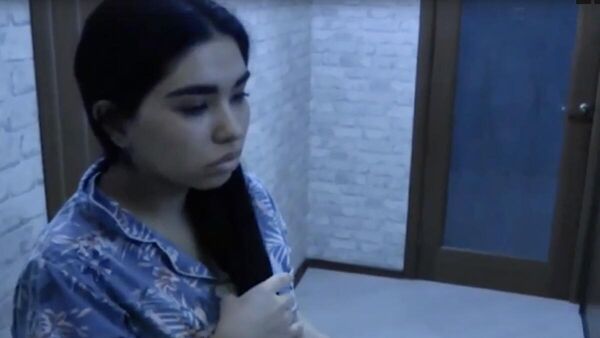 Кадр видео задержания Парвины Абузаровой