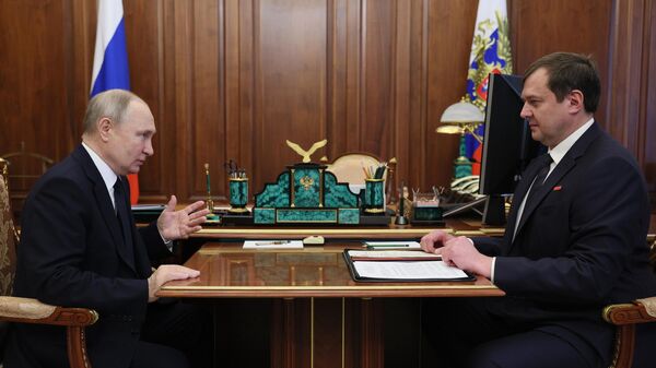 Президент РФ Владимир Путин и временно исполняющий обязанности губернатора Запорожской области Евгений Балицкий