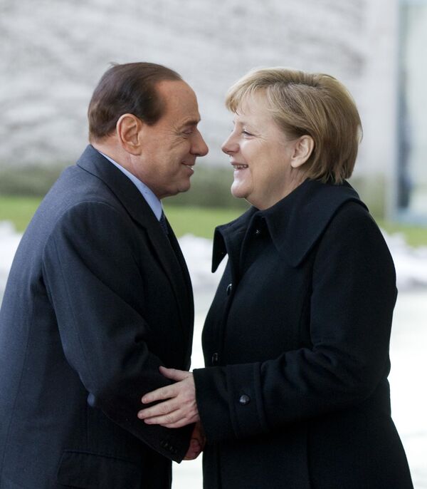 Премьер-министр Италии Сильвио Берлускони и канцлер Германии Ангела Меркель в Берлине, Германия. 12 января 2011 года
