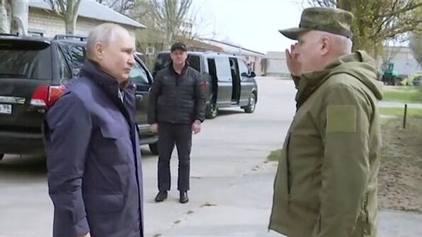 Президент РФ Владимир Путин посещает штаб группировок Днепр на Херсонском направлении  специальной военной операции. Скриншот видео