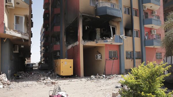 Жилые дома, поврежденные в ходе столкновений в Хартуме, Судан