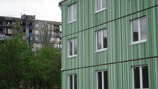 Вид на жилой дом на бульваре Шевченко в Мариуполе