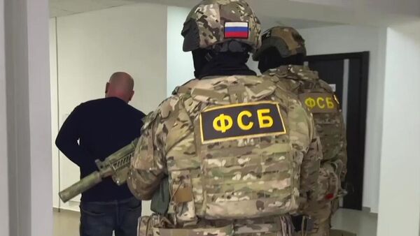 Задержание сотрудниками ФСБ Константина Евмененко. Кадр из видео
