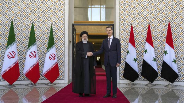 Президент Ирана Ибрахим Раиси и президент Сирии Башар Асад во время встречи в Дамаске
