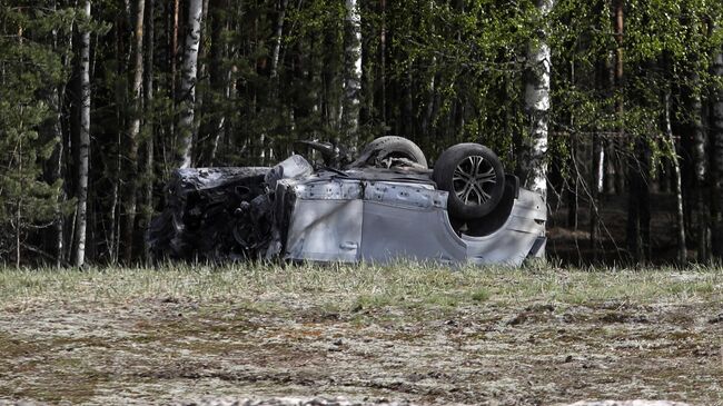 Фото с места подрыва автомобиля, в котором передвигался Захар Прилепин