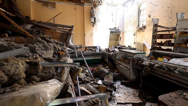 Магазин в Донецке, разрушенный в результате обстрела ВСУ