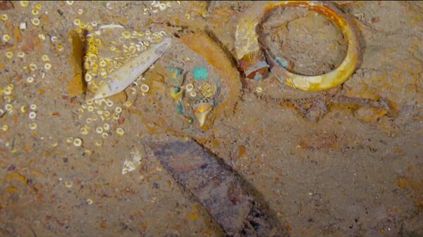 Ожерелье из зуба мегалодонта, найденное на Титанике 